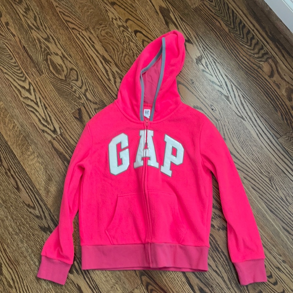 Super cute pink sweatshirt that zips up!